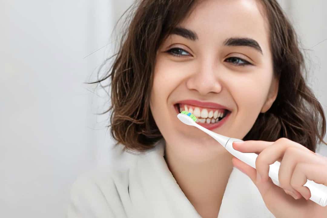 A person smiling, showing clean and healthy teeth
