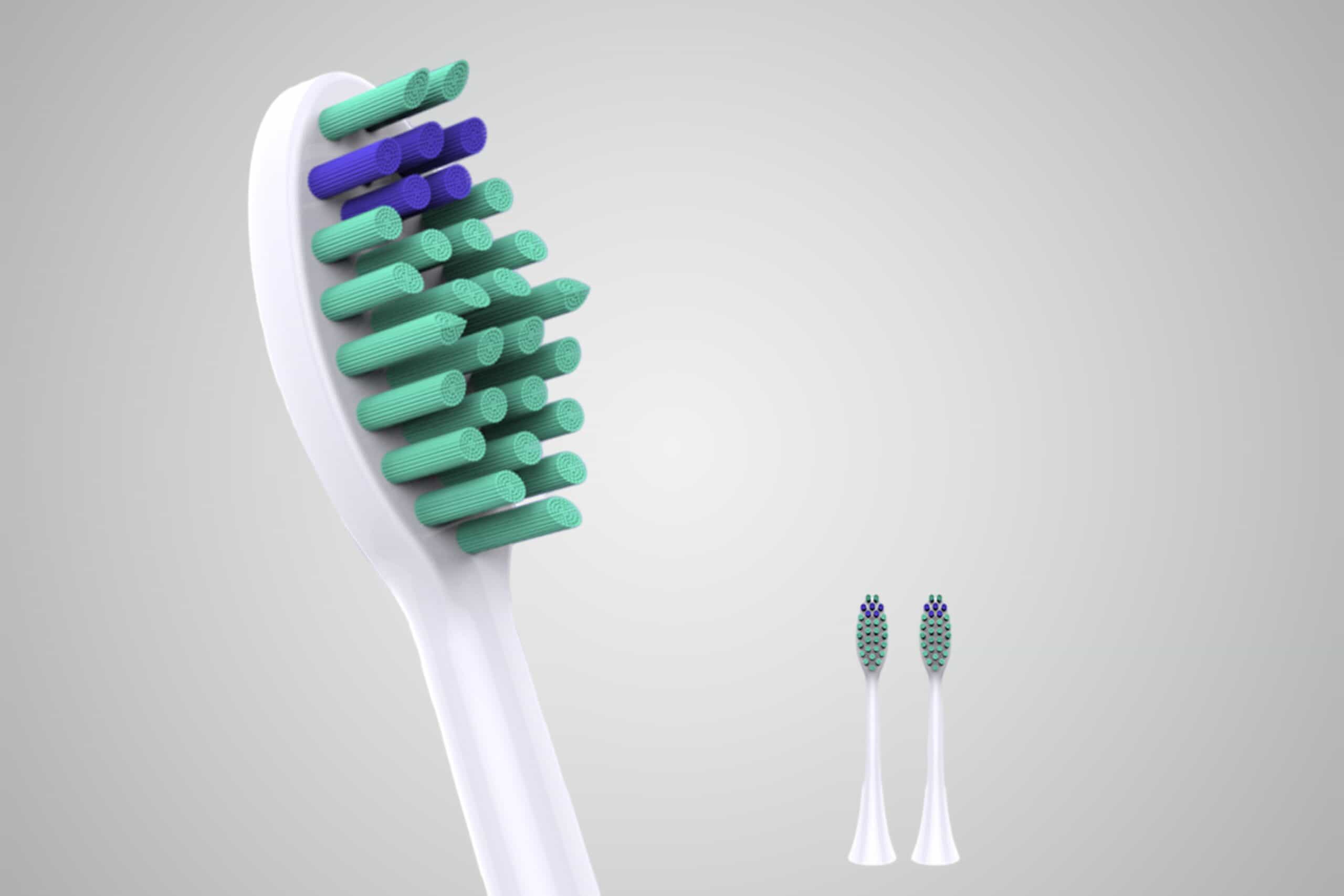 Machine tufting bristles onto an electric toothbrush head